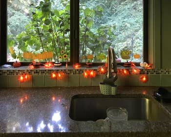 the leaf garland strung in front of a sink