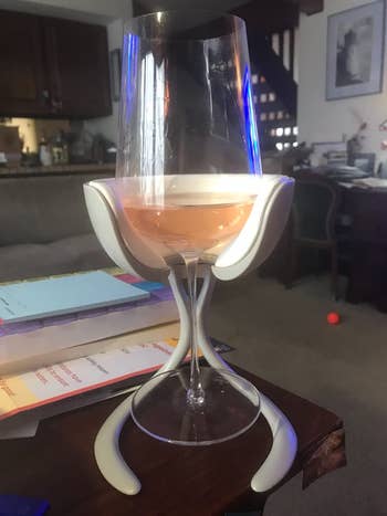reviewer using the chiller with a glass of wine