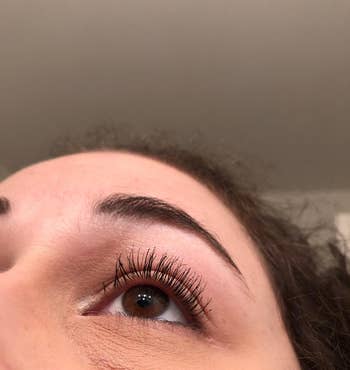 Reviewer's clump-free lashes after using the eyelash comb