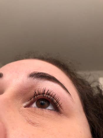 Reviewer's clump-free lashes after using the eyelash comb