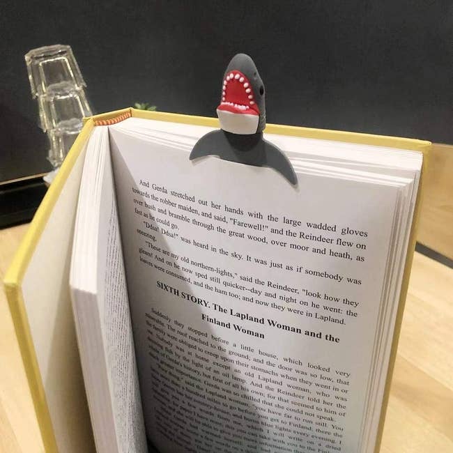 the 3D shark bookmark in a book