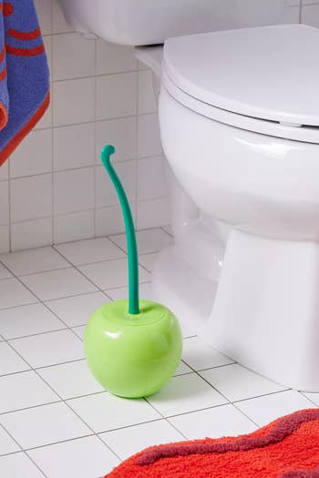 same green apple-shaped toilet brush