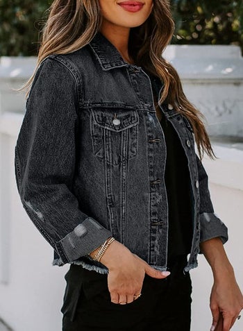 model wearing the jacket in a gray wash
