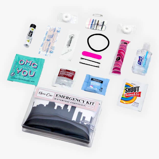 Emergency kit featuring everyday essentials: bandages, safety pins, hair ties, stain remover, hand sanitizer, nail file, tissues, and a heat wrap
