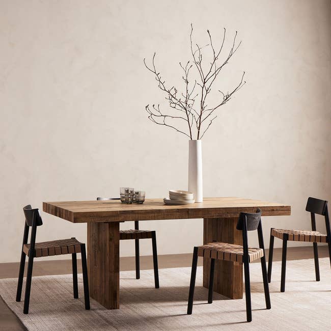 modular reclaimed wood dining table with seating for four