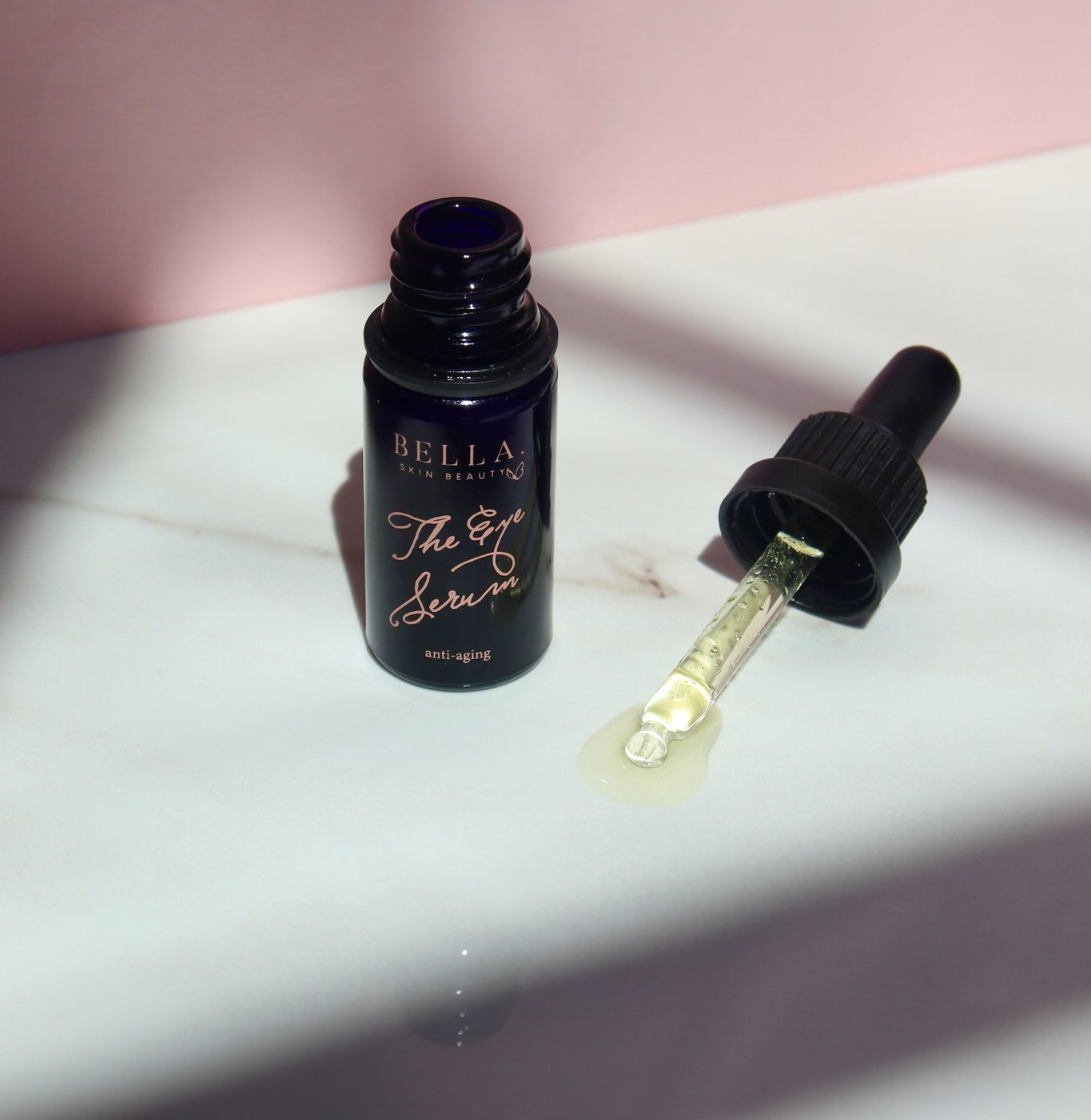 The black bottle which comes with a built-in dropper
