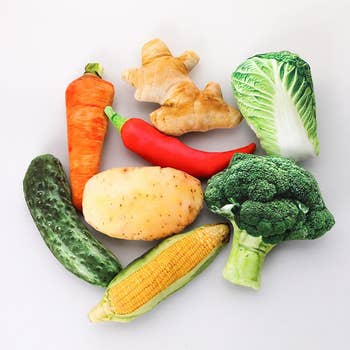cucumber, carrot, potato, corn, red pepper, lettuce, and broccoli toys