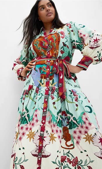 Person successful a patterned, long-sleeved formal with bold prints and a tied waist, suitable for manner shopping