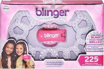 The pink hair blinger tool with gem stones included in the kit 