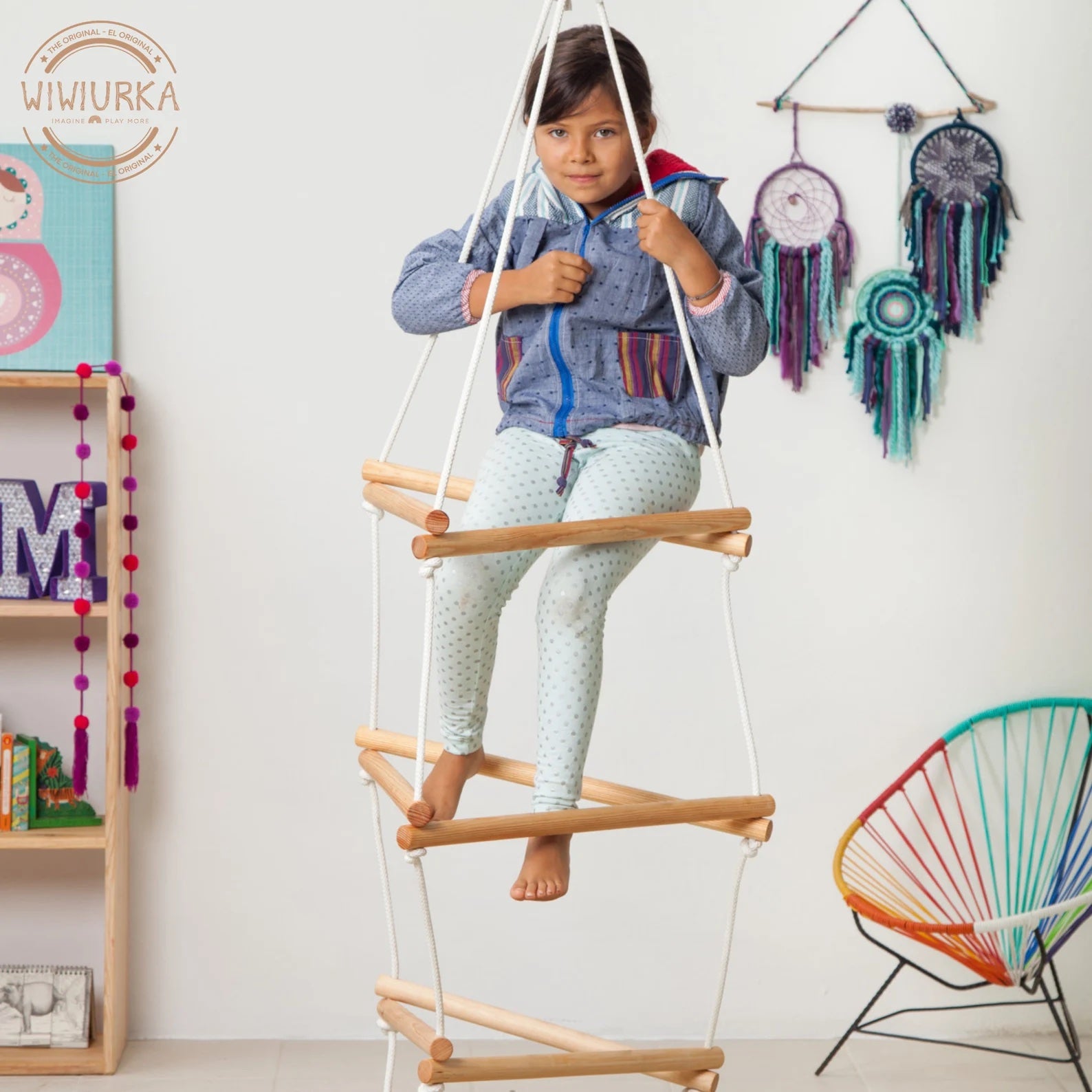 a child climbing the rope ladder