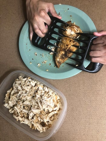 the shredder claws being used to shred cooked chicken