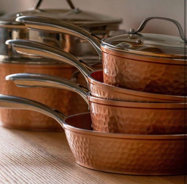 the five-piece hammered copper pan set