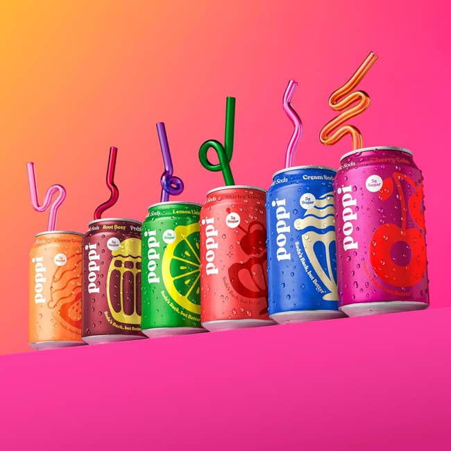 Variety of Poppi drinks successful  colorful cans with swirling straws, showcasing antithetic  flavors, against a vibrant background