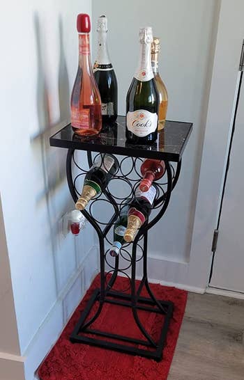 Reviewer image of wine glass rack with black tabletop