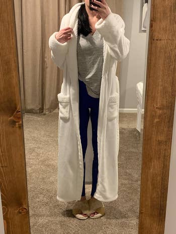 reviewer wearing the robe in white