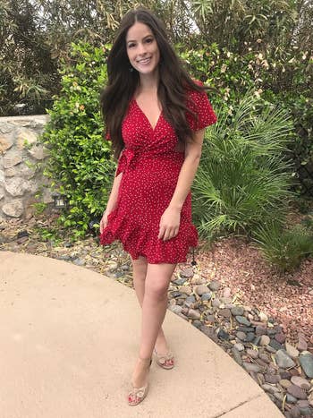reviewer in a red polka-dot dress