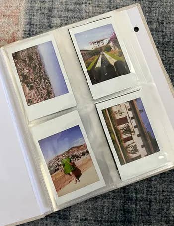 Four instant photos successful  an album, each   showing scenic outdoor views of landscapes and architectural features