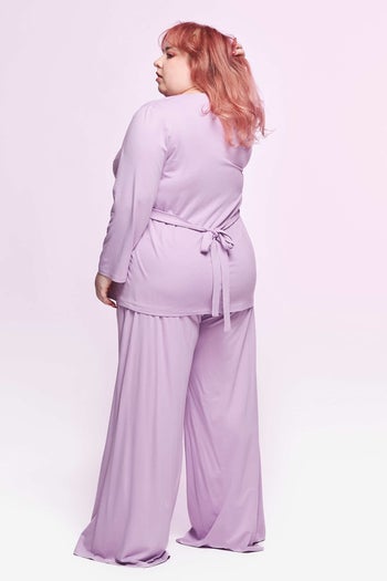 the back view of the blouse showing the tie closure in the back 