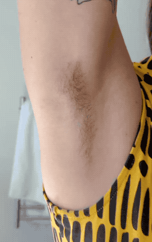 a gif of someone shaving their armpit with the Leaf razor 