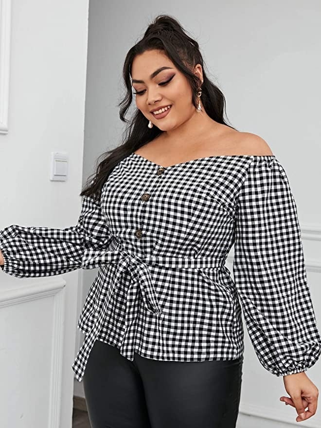 model wearing the tie-waist gingham top