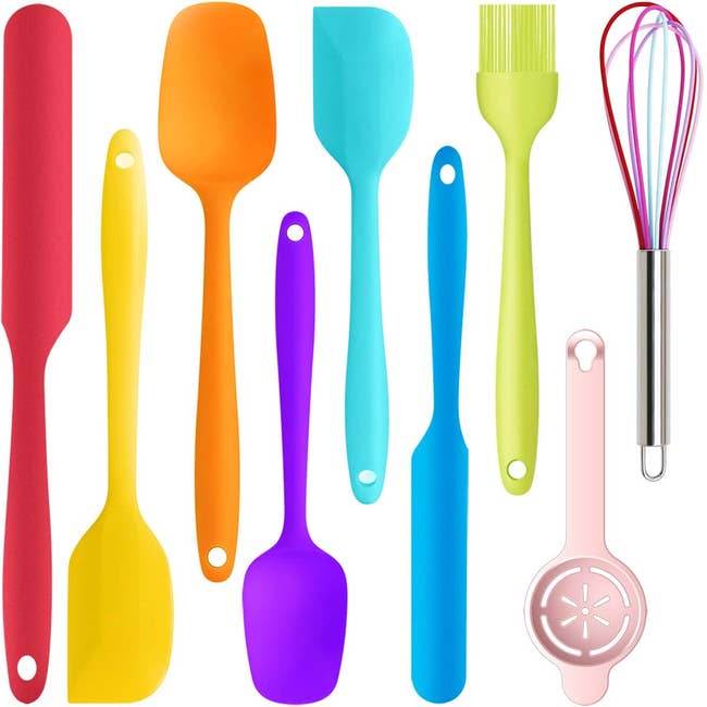 the spatulas, spreaders, whisk, and egg separator in rainbow colors