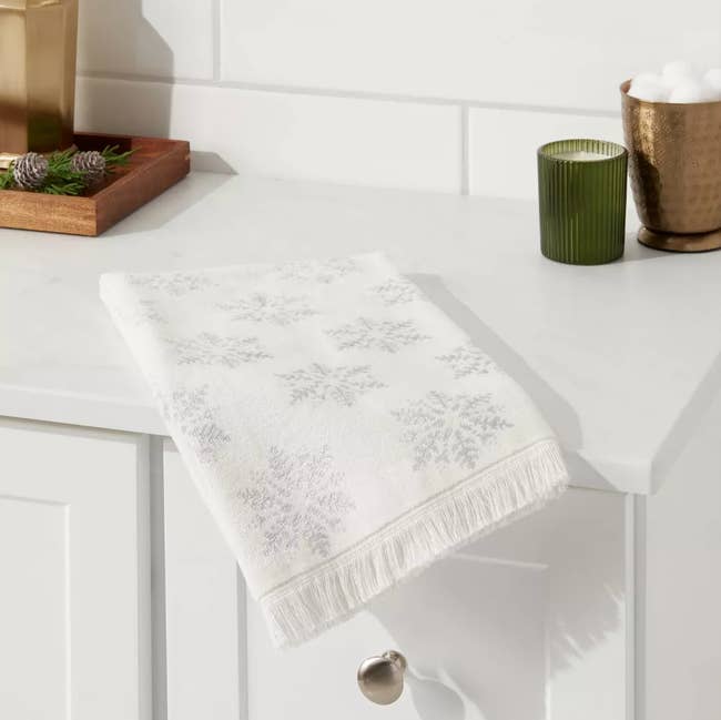 the hand towel with a snowflake design