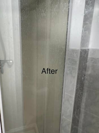Shower glass with text 
