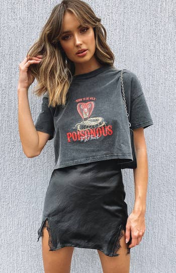 Model wearing a graphic tee with 