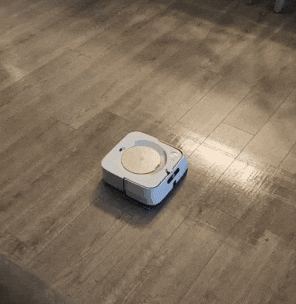 gif of robot spraying water and mopping