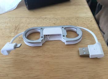  USB cable keychain on table 