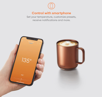 person setting temperature of ember mug on smartphone