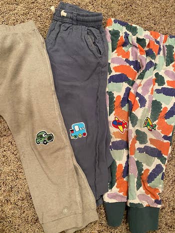 kids pants with car patches covering holes