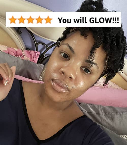 reviewer's photo showing their face glowing after using the serum