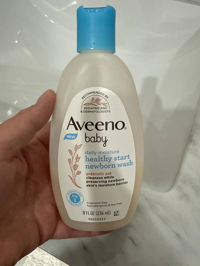 Aveeno Baby Daily Moisture Healthy Start Newborn Wash vessel with prebiotic oat, designed to sphere newborn skin's moisture, 8 fl oz
