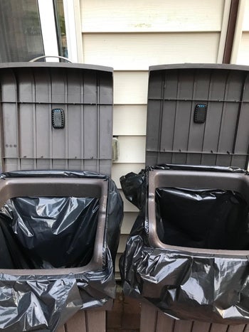 two trash cans with the insect killer in the lid