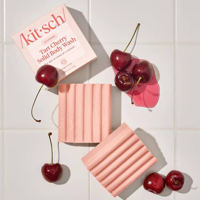 Tart cherry coagulated  assemblage  lavation  bars adjacent  to caller  cherries connected  a tile surface, highlighting a fruity and refreshing bathing option