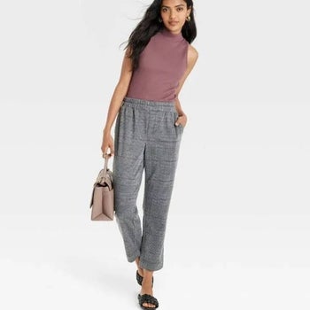 model wearing the pants in heather gray plaid