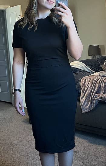 Image of reviewer wearing black dress