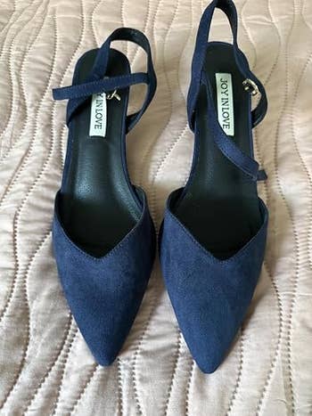 Pointed toe, ankle strap precocious heels connected a quilted surface, showcasing elegant footwear style