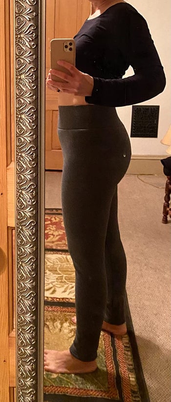 reviewer mirror selfie, side profile, wearing gray fleece-lined leggings