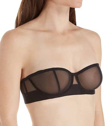 model wearing the strapless bra in black