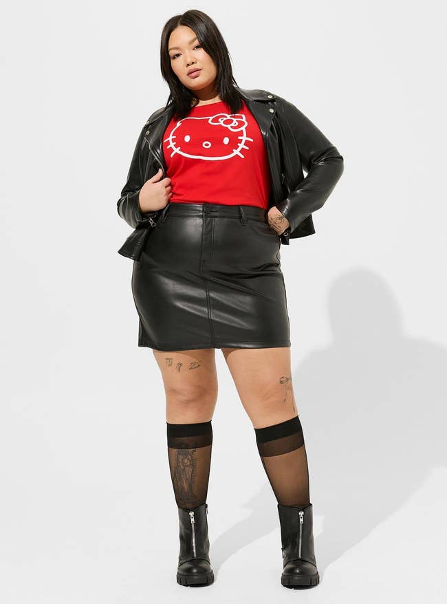 model in the faux leather mini skirt