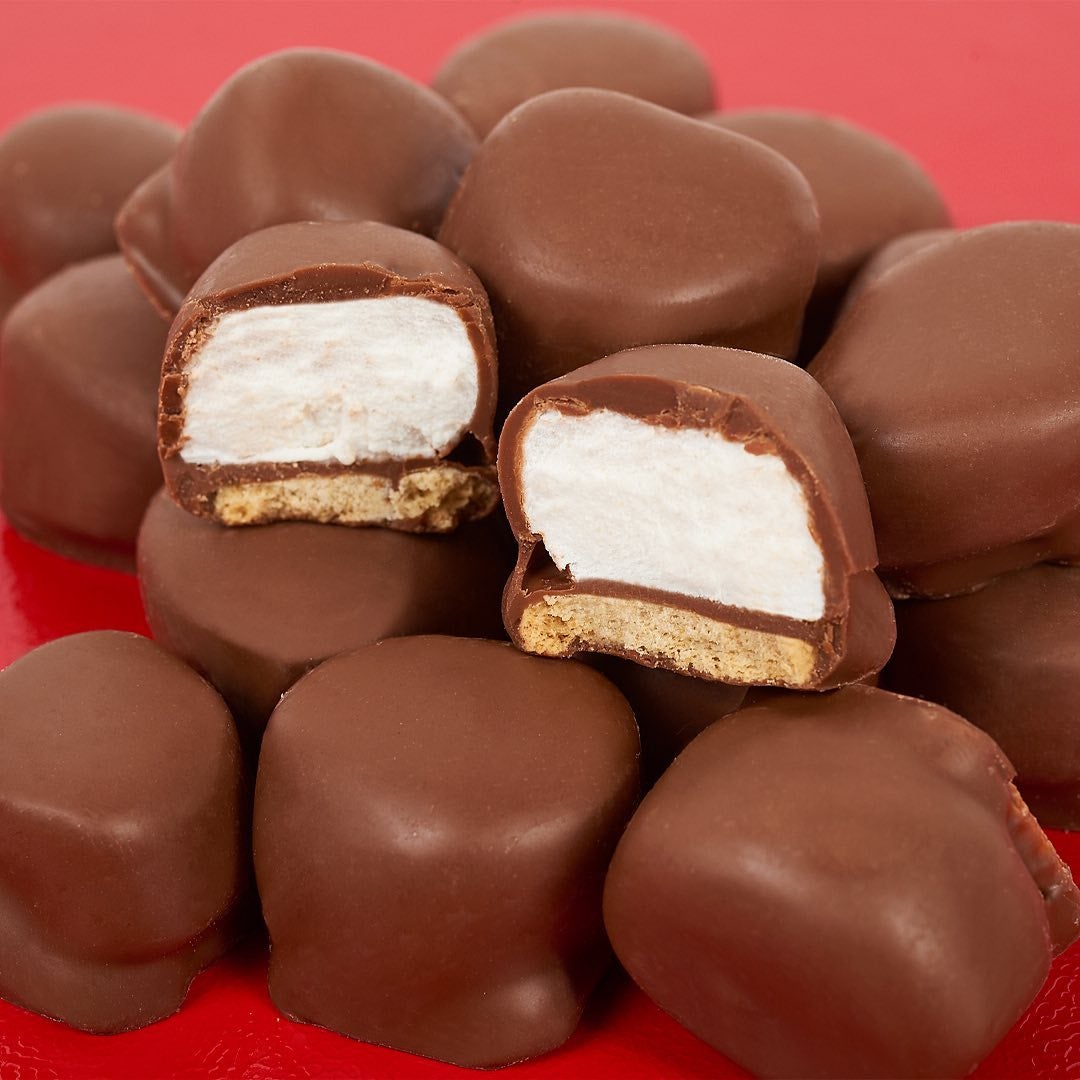 The s'mores bites with a cross-section showing the layers