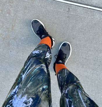 me, wearing the orange pair of socks on a walk/run outside