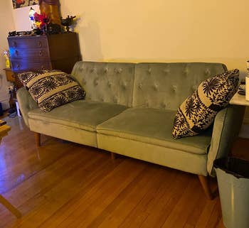 reviewer photo of the green couch