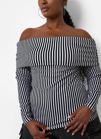 closeup of the off-the-shoulder black and white top