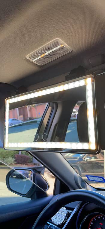 a review photo of the vanity mirror lit