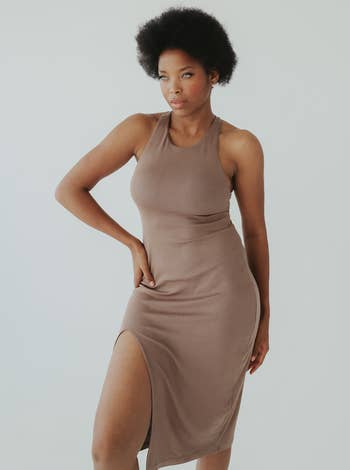 a model wearing the same dress in light brown 