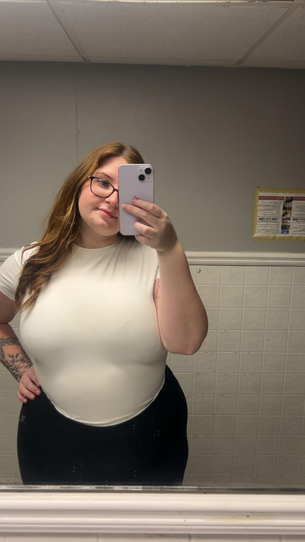 Person taking a reflector  selfie successful  casual achromatic  apical  and achromatic  pants