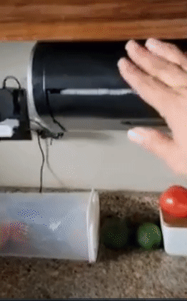 Reviewer waving a hand to summon a paper towel and then waiting for it to retract again